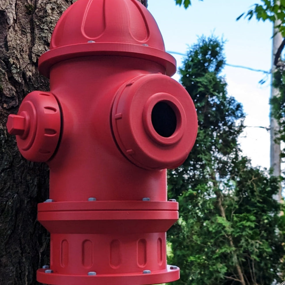 Red fire hydrant Birdhouse mounted to a tree