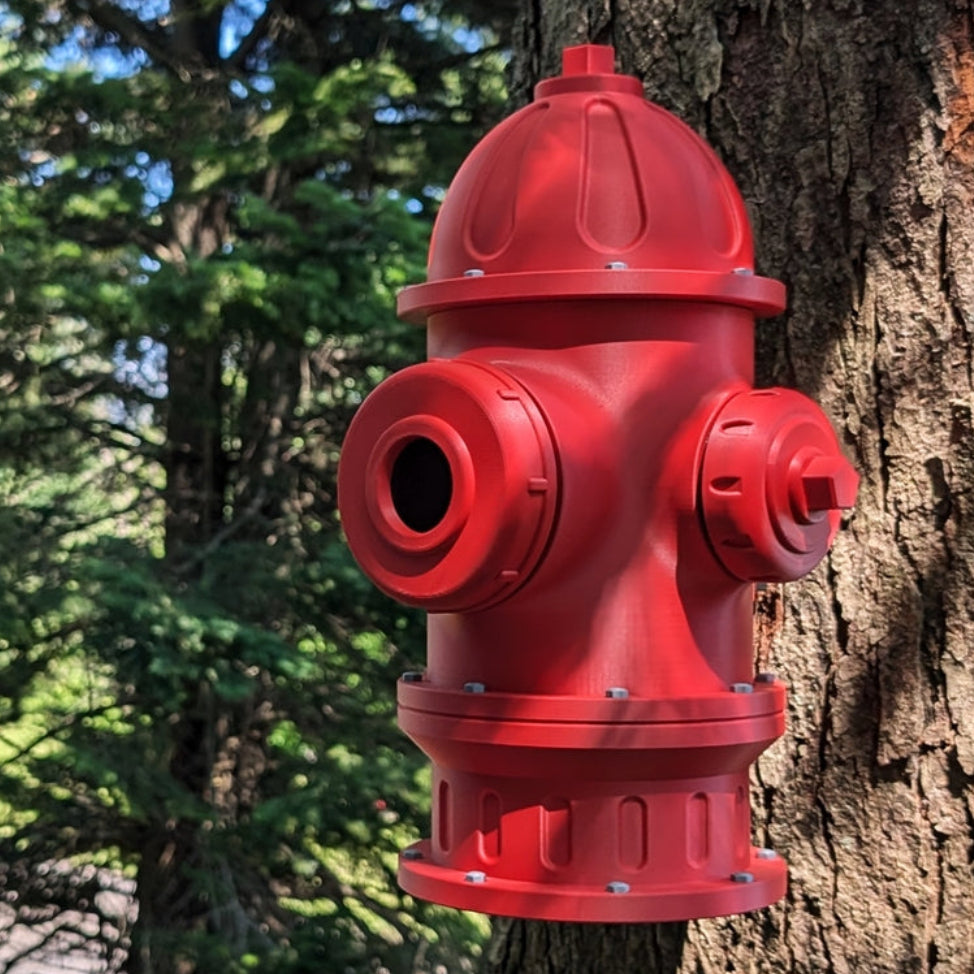 Red fire hydrant Birdhouse mounted to a tree