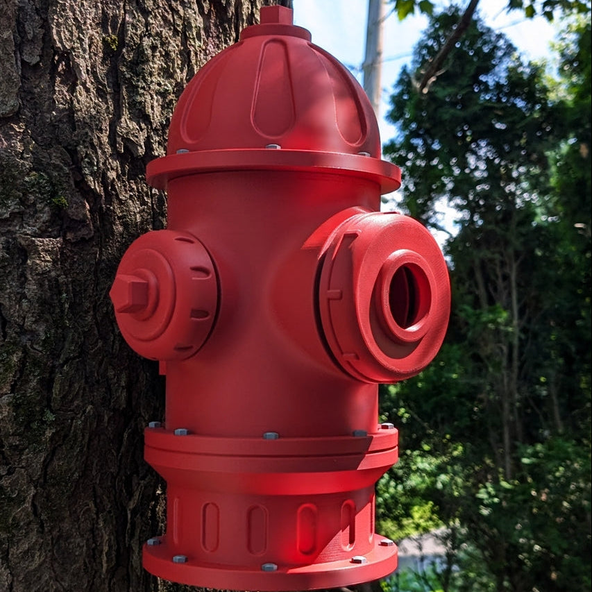 red fire hydrant Birdhouse mounted to a tree