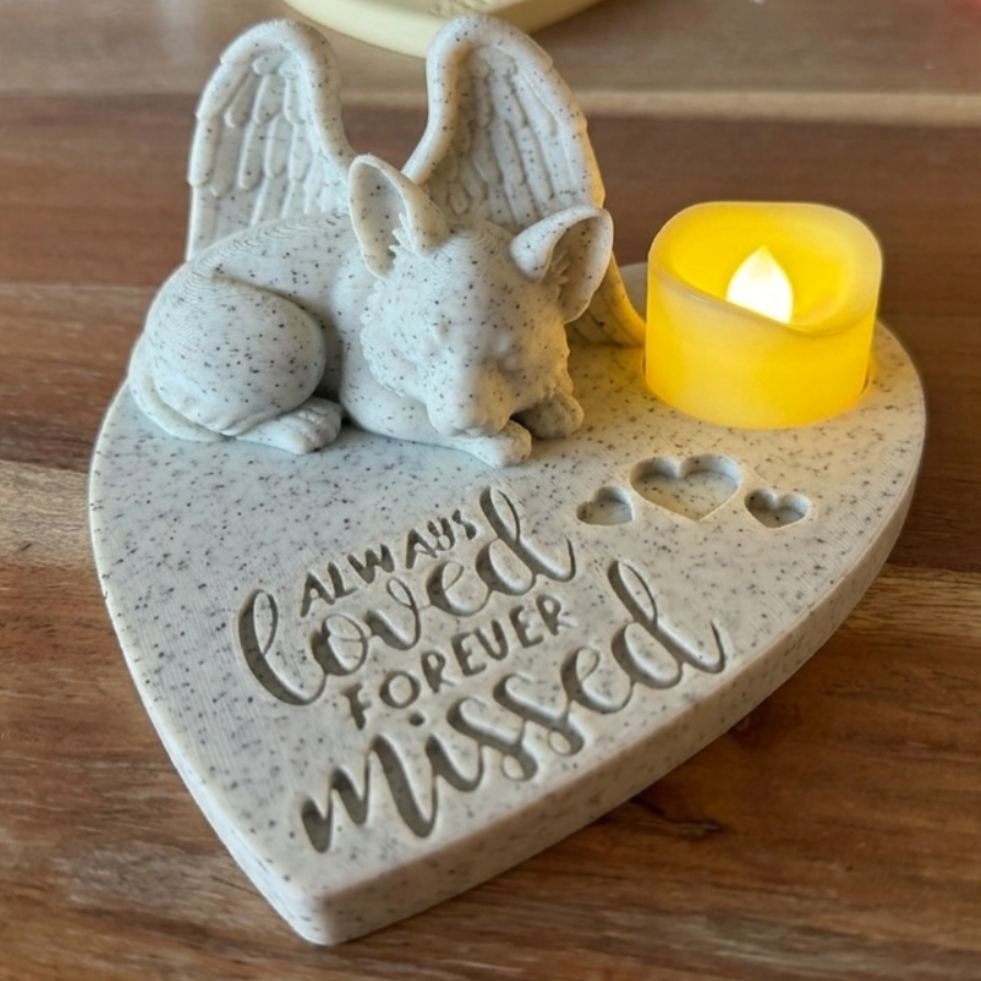 Memorial plaque featuring a corgi with Angel wings and 'Always Loved Forever Missed' text on a wooden surface.