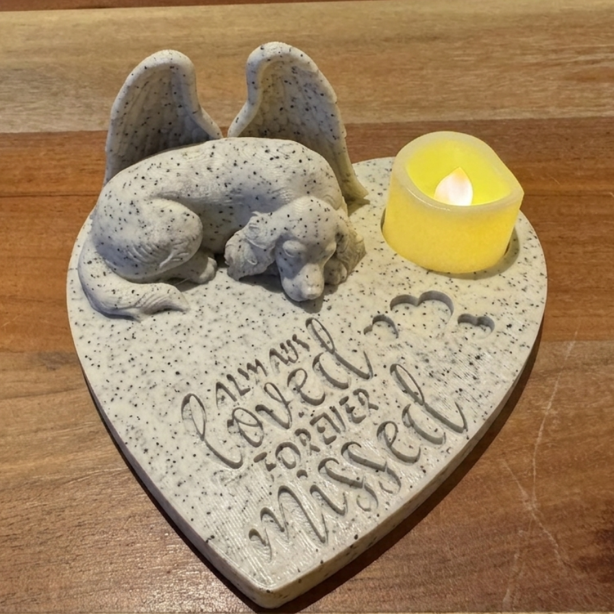 Heart-shaped Memorial featuring an English setter with Angel wings and candle on a wooden surface