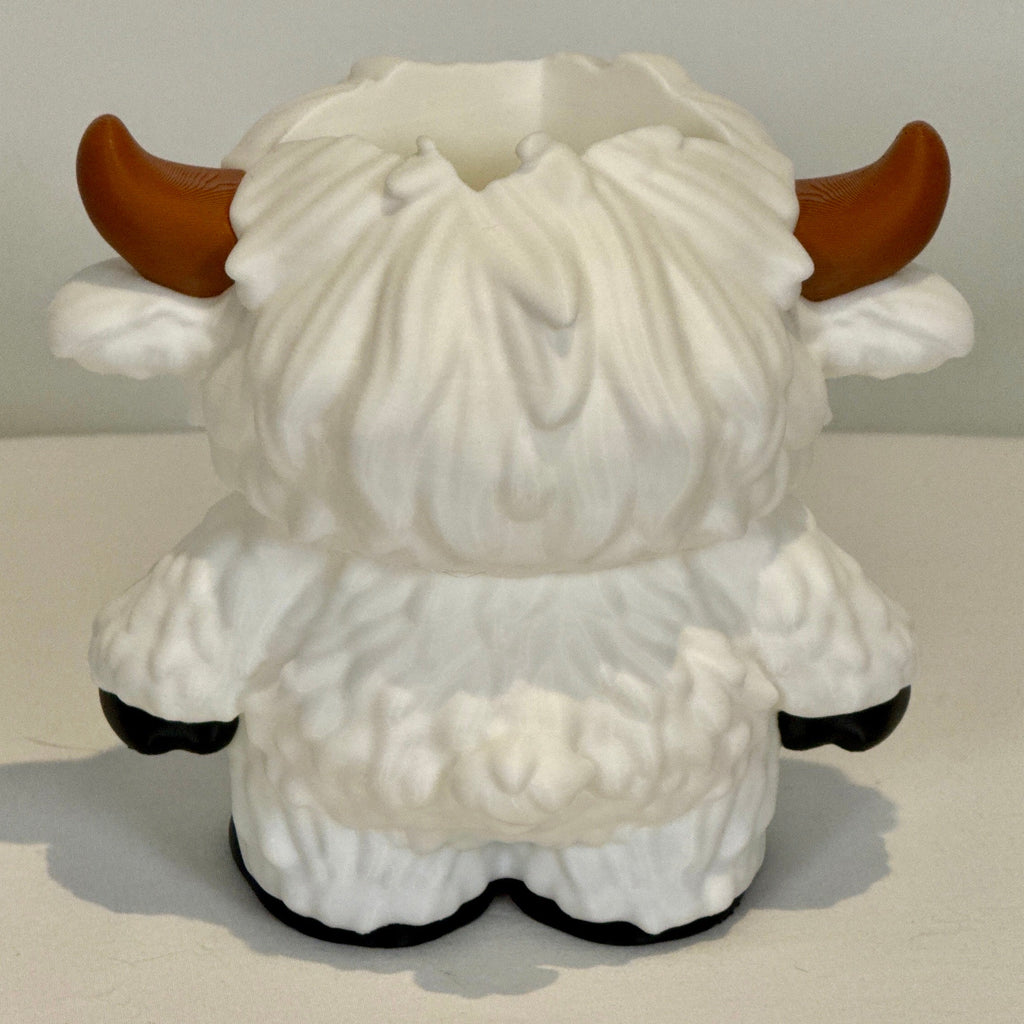 white Highland cow soap bottle holder. Rear view
