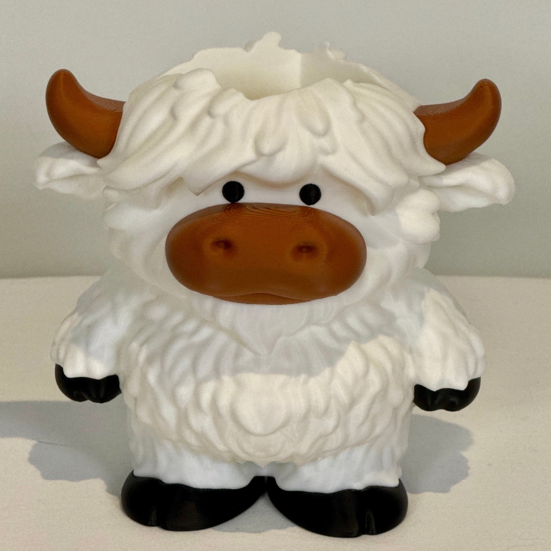 White Highland cow soap bottle holder front view