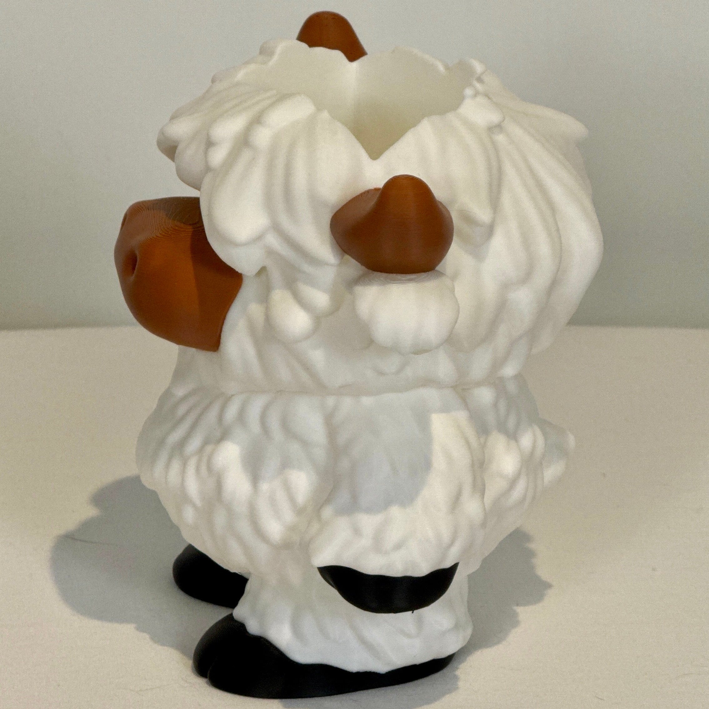 white Highland cow soap bottle holder, left side view