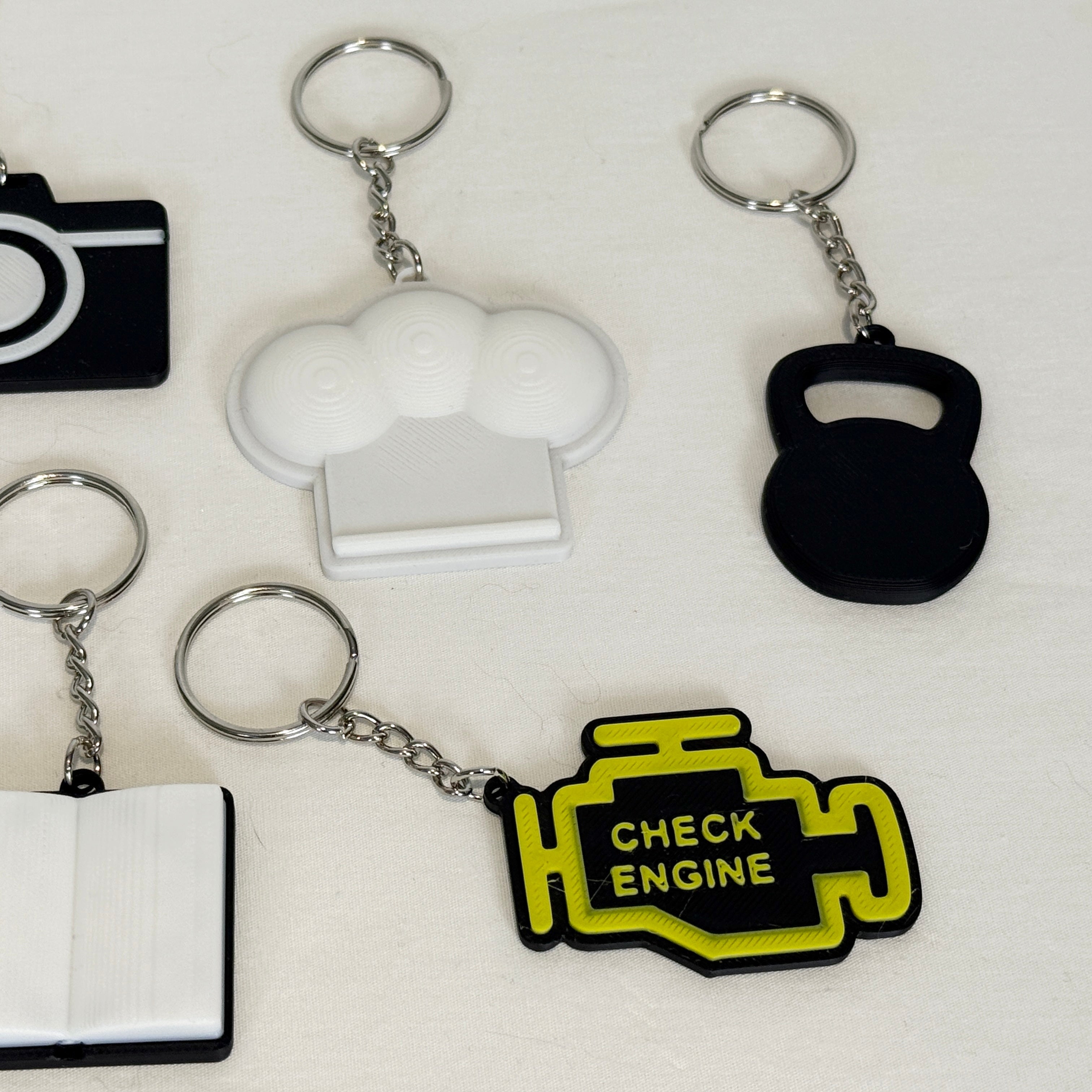Collection of various keychains on a white background