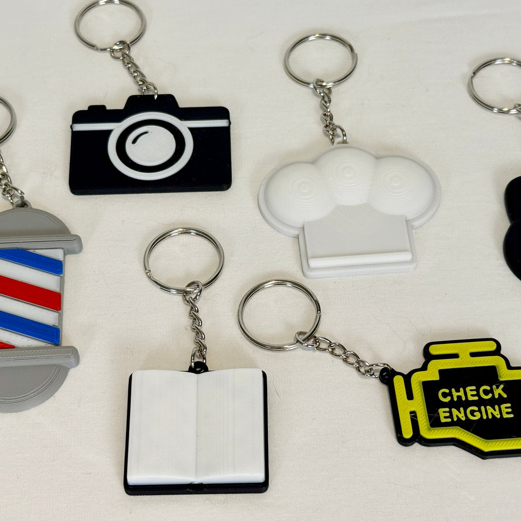 Collection of various keychains on a white background