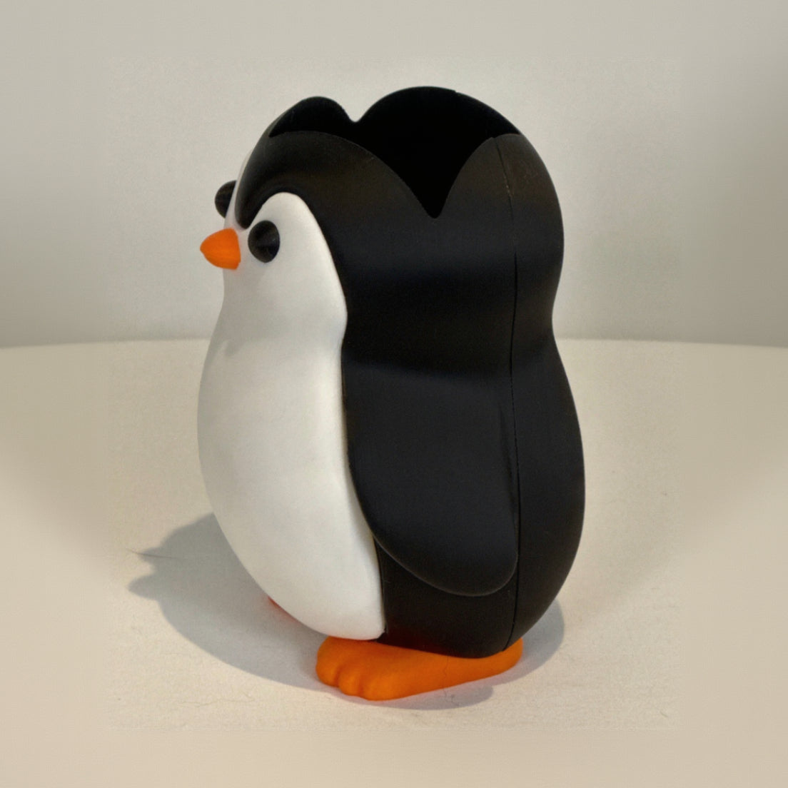 Penguin soap bottle Holder left side View