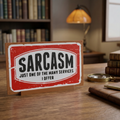 sarcasm. Just one of the many services I offer sign. Sitting on a desk