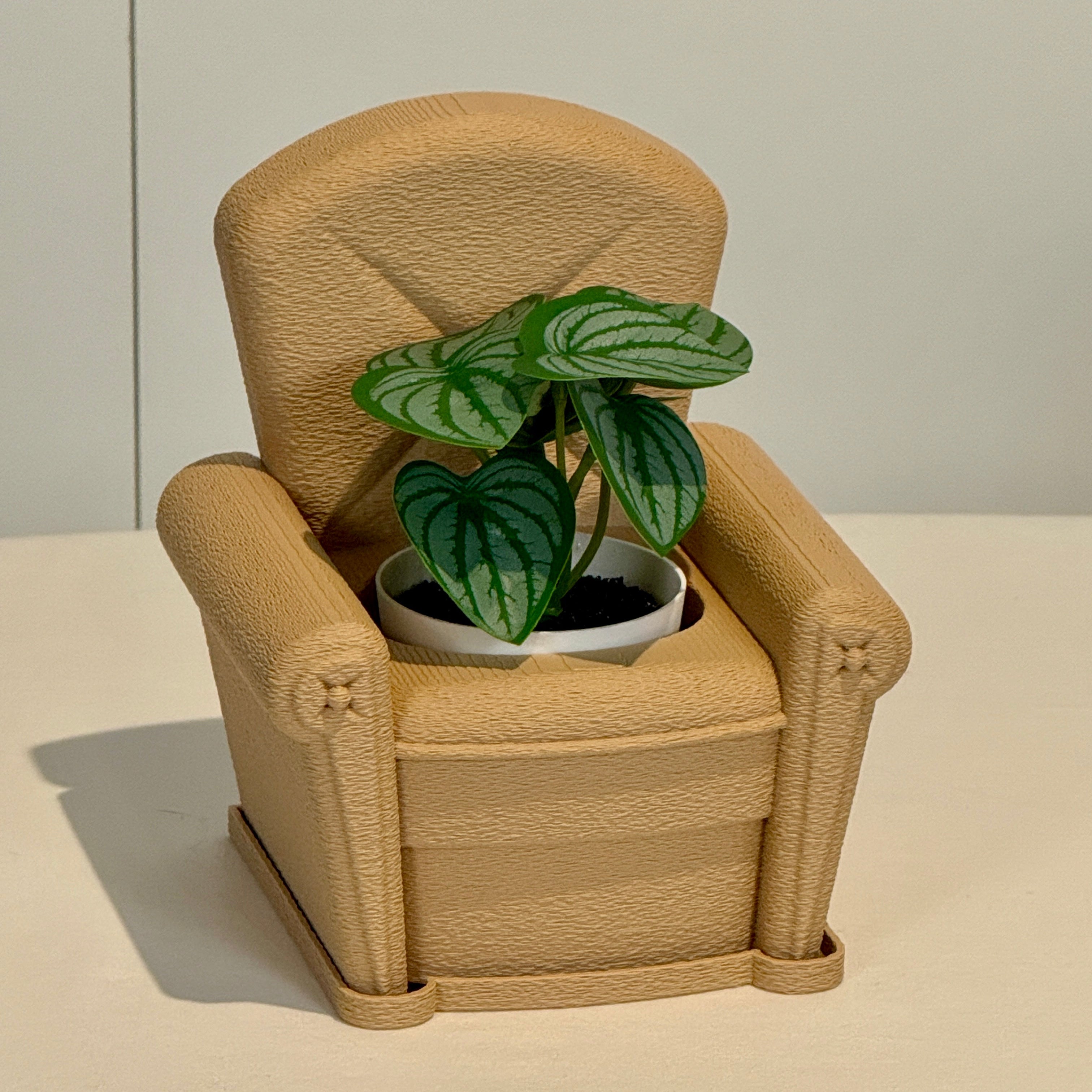 3D Printed armchair planter Front view with fake plant