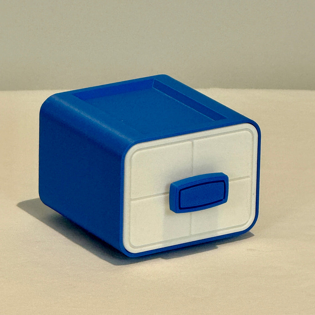Blue and white storage box on a beige surface with a light gray background