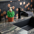 3D printed succulent soap bottle holder by the sink